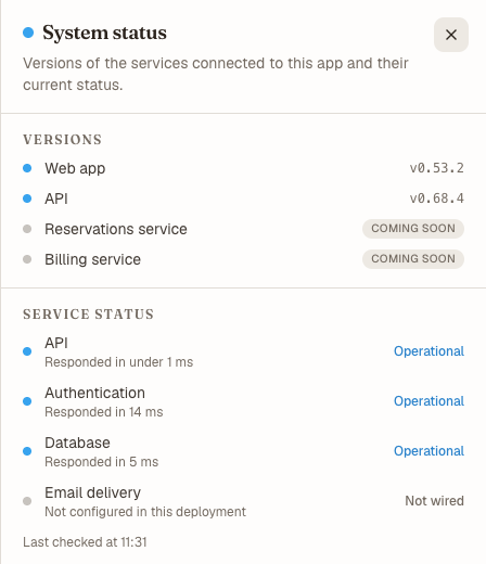 The System status panel with everything reporting normally: API, Authentication and Database operational with their response times, Email delivery marked Not wired, and the Reservations and Billing services greyed out as coming soon.
